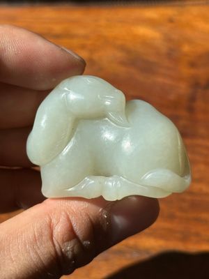 A Chinese white jade carving of a reclining camel, Qing — photo 1