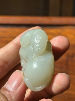 A Chinese white jade carving of a reclining camel, Qing — photo 7