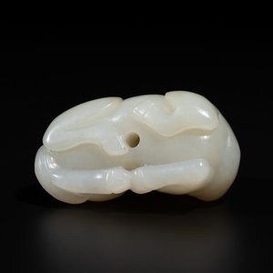A Chinese white jade carving of a reclining camel, Qing — photo 6