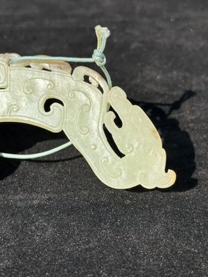 A Chinese white jade 'chilong' amulet, 17/18th C. — photo 8