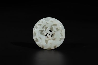 A Chinese white jade 'chilong' 'bi' disc, Qing