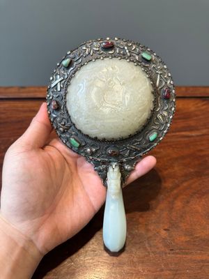A Chinese white jade-mounted and gemstone inlaid silver hand mirror, 19/20th C. — photo 1