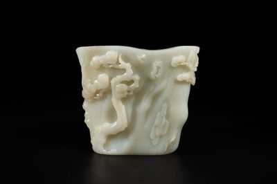 A Chinese white jade 'pine tree' brush pot, Qianlong
