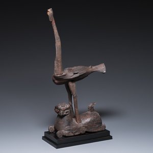 A Chinese wooden sculpture of a crane dominating a tiger, Warring States Period — photo 1