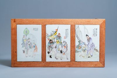A Chinese wooden table with three qianjiang cai plaques, 19/20th C.