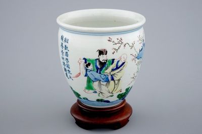A Chinese wucai brush pot on wooden stand, Transitional period, 1620-1683