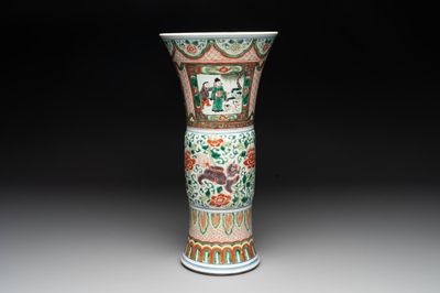 A Chinese wucai 'gu' vase with Buddhist lions, peony scrolls and figures, 19th C.