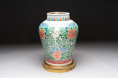 A Chinese wucai 'He He Er Xian' vase on gilt-bronze stand, 19th C.