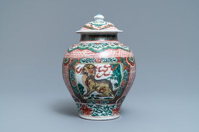 A Chinese wucai ‘mythical beasts’ vase and cover, Transitional period