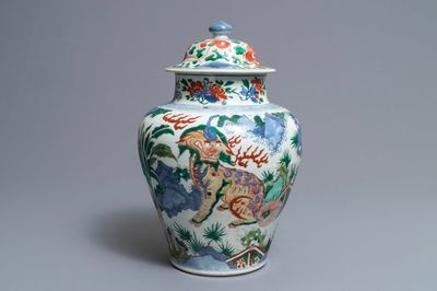 A Chinese wucai ‘mythical beasts’ vase and cover, Transitional period