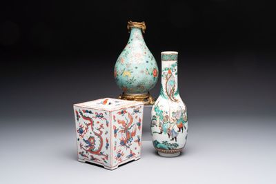A Chinese wucai square covered container, a gilt bronze-mounted famille verte vase and a Canton famille verte bottle vase, Kangxi and later
