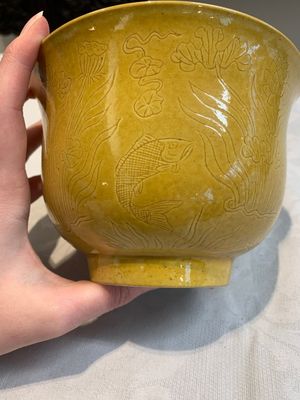 A Chinese yellow-glazed 'anhua' 'carp and lotus' bowl, Kangxi mark, 19th C. — photo 11