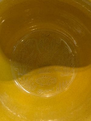 A Chinese yellow-glazed 'anhua' 'carp and lotus' bowl, Kangxi mark, 19th C. — photo 7