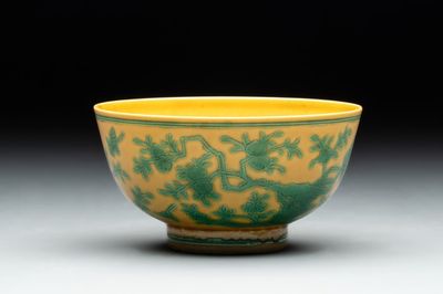A Chinese yellow-ground 'birds and peaches' bowl, Guangxu mark and possibly of the period