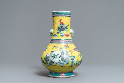 A Chinese yellow-ground famille rose bottle vase with antiquities design, Yongzheng
