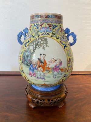 A Chinese yellow-ground famille rose 'hu' vase with playing boys, Qianlong mark, Republic — photo 3