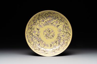 A Chinese yellow-ground famille rose 'magpie and plum tree' plate, Tongzhi mark and of the period