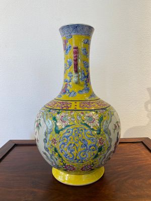 A Chinese yellow-ground famille rose 'nine peaches' bottle vase, Jiaqing — photo 2