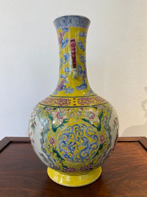 A Chinese yellow-ground famille rose 'nine peaches' bottle vase, Jiaqing — photo 4