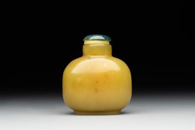 A Chinese yellow jade snuff bottle with moss agate cover and bone stopper, 19th C.