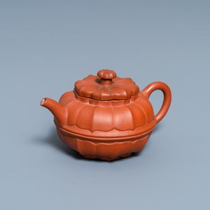 A Chinese Yixing stoneware chrysanthemum-shaped teapot and cover, Yongzheng/Qianlong — photo 1