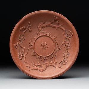 A Chinese Yixing stoneware cup and saucer with plum blossom relief design, Kangxi — photo 2