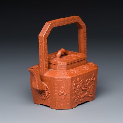 A Chinese Yixing stoneware 'Floral' teapot and cover, Kangxi