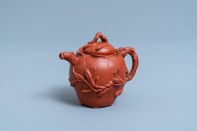 A Chinese Yixing stoneware lotus-shaped teapot and cover, Kangxi