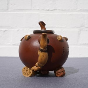 A Chinese Yixing stoneware relief-decorated teapot with nuts and fruits, Shao Er Quan mark, Daoguang — 照片 9