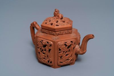 A Chinese Yixing stoneware reticulated teapot and cover, Kangxi
