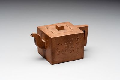 A Chinese Yixing stoneware teapot and cover, signed Hu Yaoting 胡耀庭, dated 1912