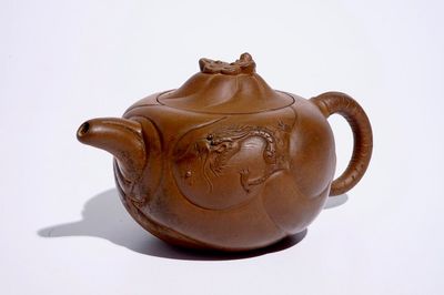 A Chinese Yixing stoneware teapot and cover with dragons, 19/20th C.