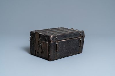 A chiseled leather-clad wooden travel casket, France, 15th C.