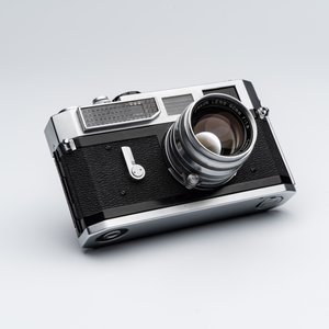 A CLA'd Canon 7 with a Canon LTM 50mm F1.8 lens and a metal cord — photo 1