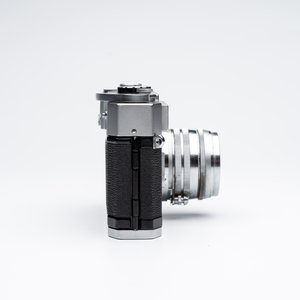 A CLA'd Canon 7 with a Canon LTM 50mm F1.8 lens and a metal cord — photo 8
