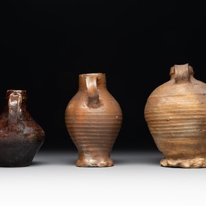 A collection of 13 German stoneware jugs, 15th C. and later — photo 11