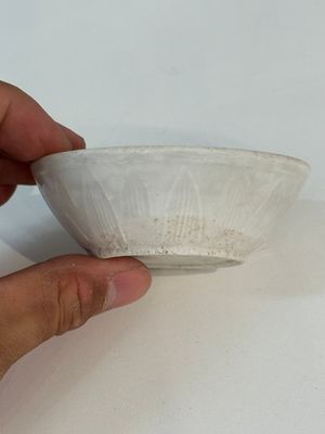 A collection of 14 Chinese ding-type and white-glazed wares, Song/Ming — photo 49