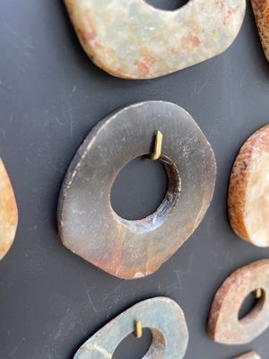 A collection of 16 Chinese neolithic jade 'bi' discs, probably Shang — photo 4