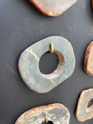 A collection of 16 Chinese neolithic jade 'bi' discs, probably Shang — photo 5
