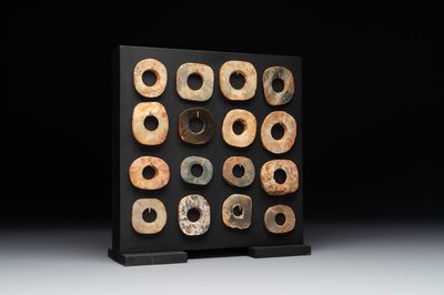 A collection of 16 Chinese neolithic jade 'bi' discs, probably Shang