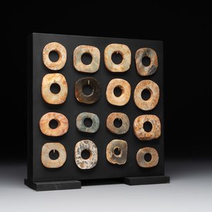 A collection of 16 Chinese neolithic jade 'bi' discs, probably Shang — photo 1