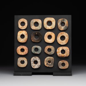 A collection of 16 Chinese neolithic jade 'bi' discs, probably Shang — photo 2