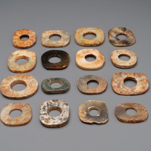 A collection of 16 Chinese neolithic jade 'bi' discs, probably Shang — photo 4