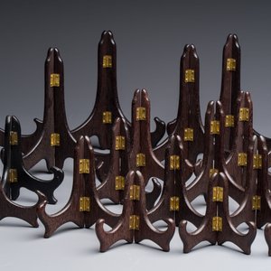 A collection of 35 Chinese folding wooden plate stands, 20th C. — photo 3