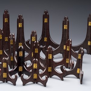 A collection of 35 Chinese folding wooden plate stands, 20th C. — photo 4