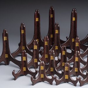 A collection of 35 Chinese wooden folding plate stands, 20th C. — photo 2