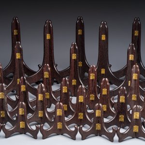 A collection of 35 Chinese wooden folding plate stands, 20th C. — photo 3