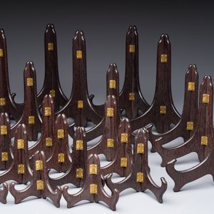 A collection of 35 Chinese wooden folding plate stands, 20th C. — photo 4