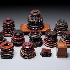 A collection of 38 Chinese wooden stands and a box, 19/20th C. — photo 1