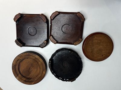 A collection of 40 mainly Chinese wooden stands, 19/20th C. — photo 18
